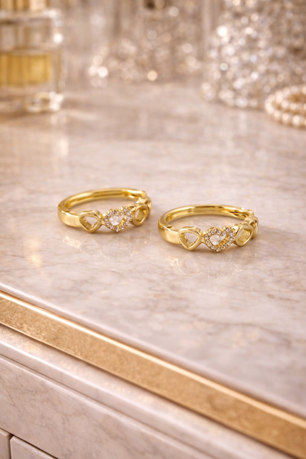 Elara Trio Heart Huggie Earrings