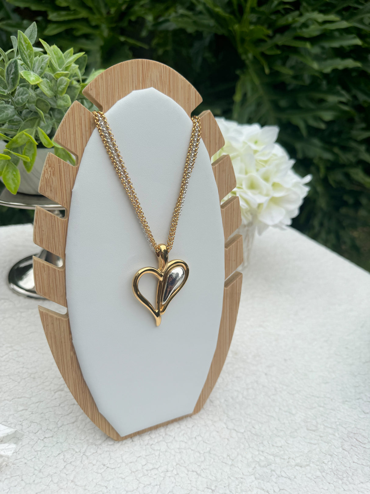 Tra-La-Ra bi-color heart necklace