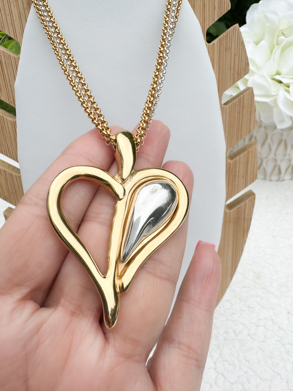 Tra-La-Ra bi-color heart necklace