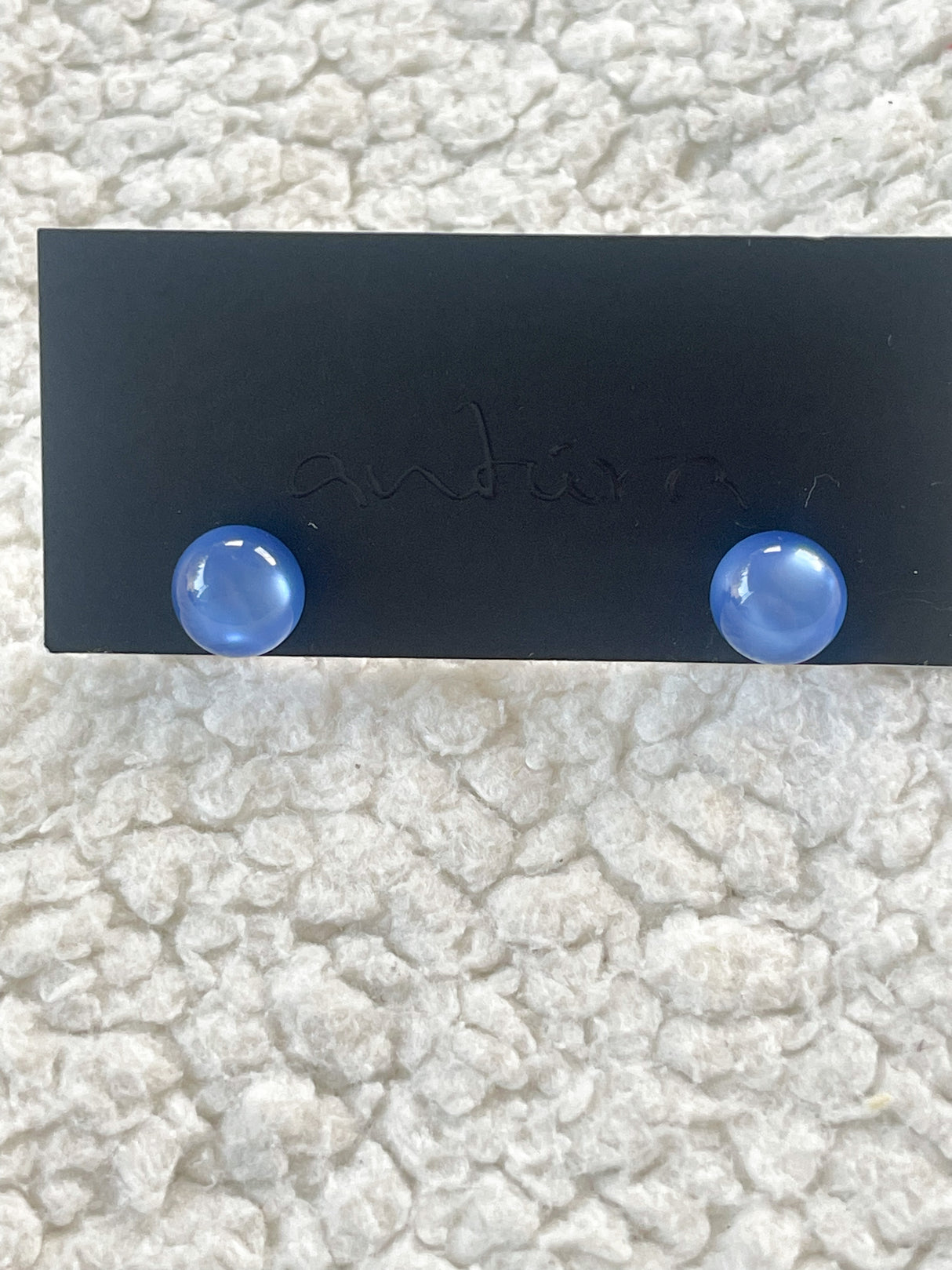 Globe earrings by Antúra