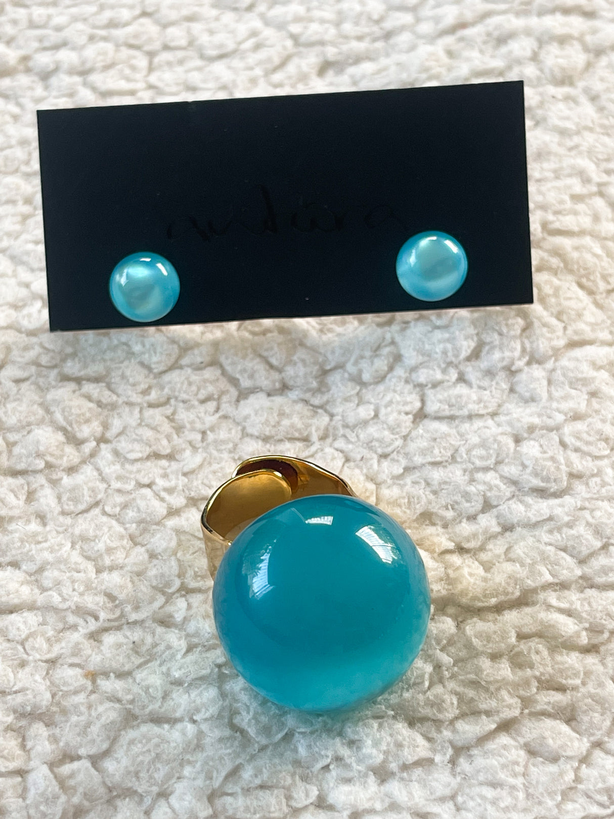 Globe earrings by Antúra