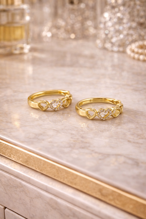 Elara Trio Heart Huggie Earrings