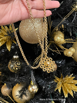 Tucco flower charm necklace