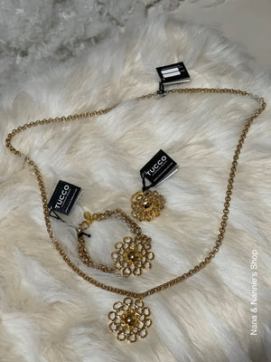 Tucco flower charm necklace