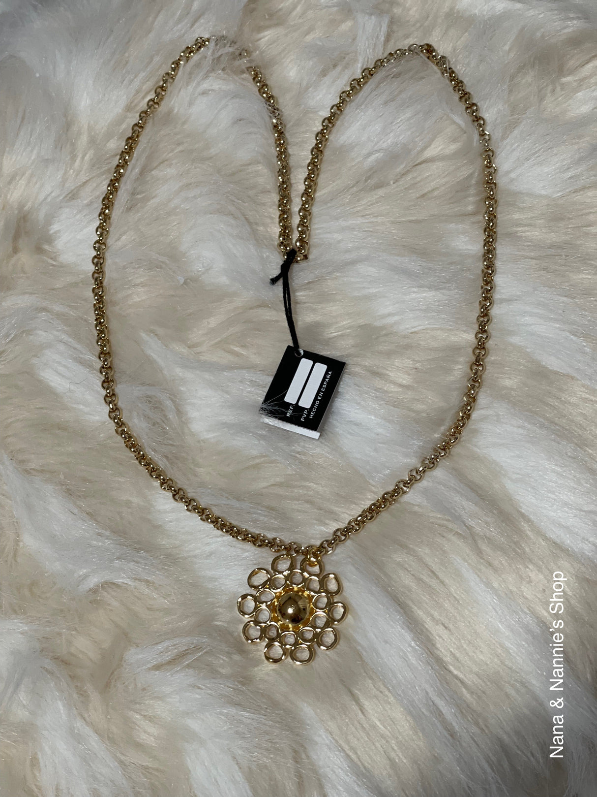 Tucco flower charm necklace