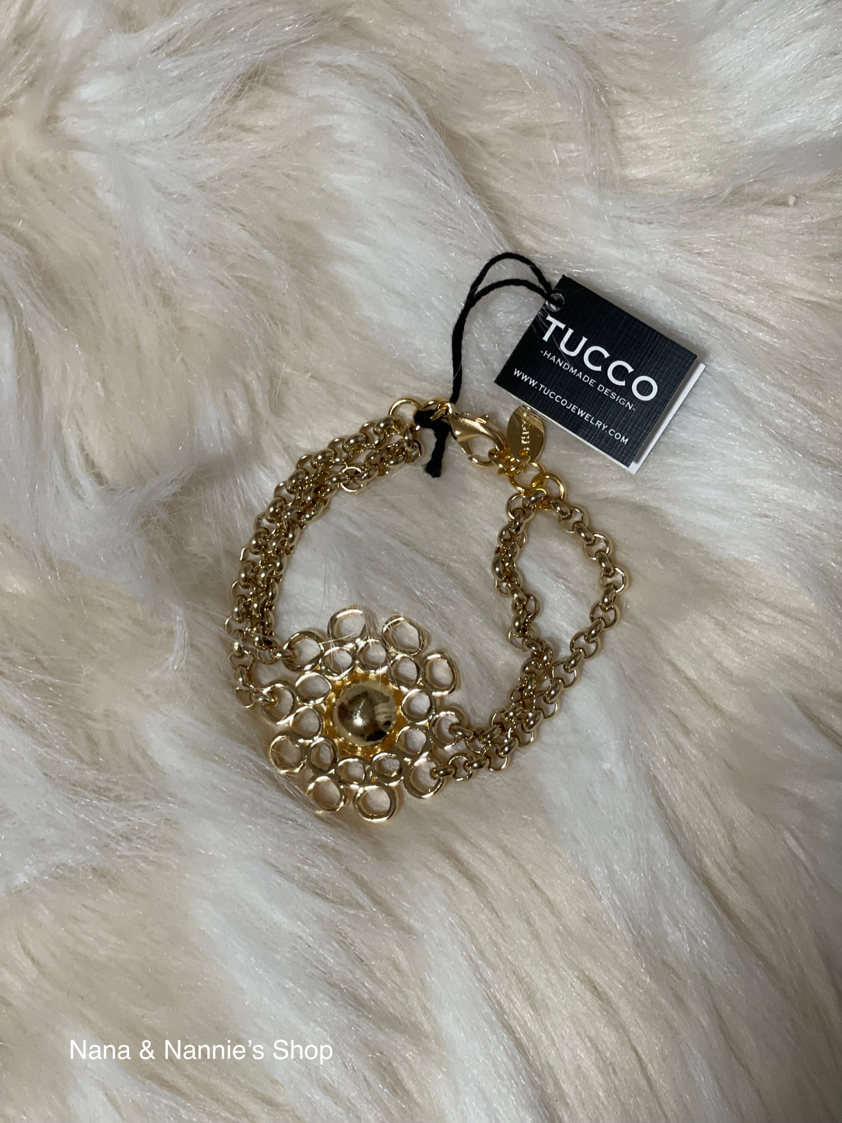 Tucco flower charm bracelet